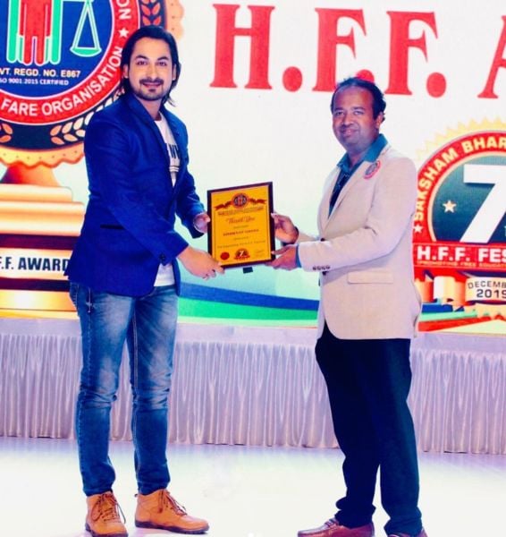 Bishwajit Ghosh being honoured by the Humanity First Foundation