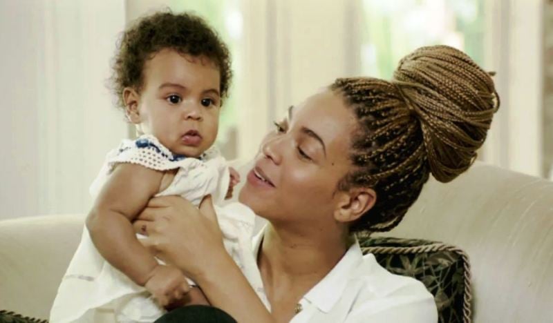 Blue Ivy Carter with Beyoncé in a still from the documentary-live concert film 