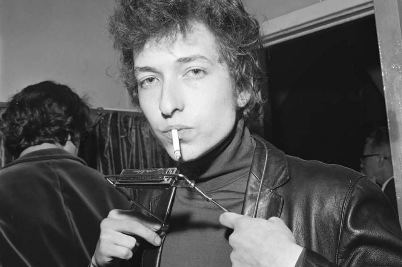 Bob Dylan while smoking a cigarette