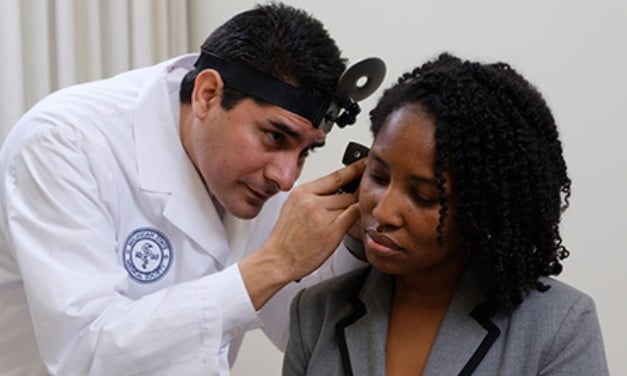 Bobby Mukkamala while treating a patient