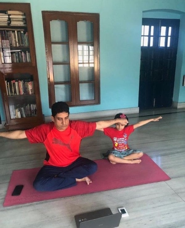 Boria Majumdar practicing Yoga with his daughter Aisha