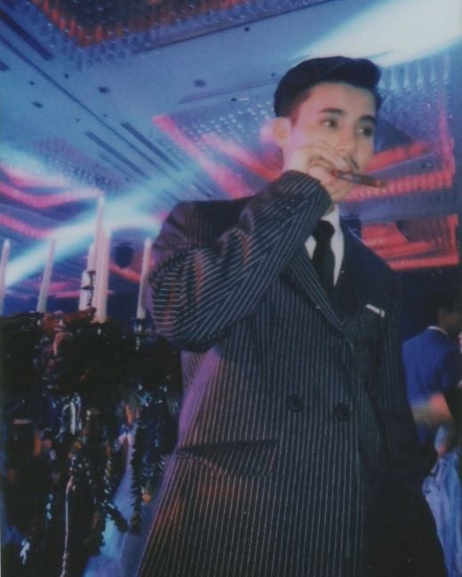 Brent Manalo smoking a cigar