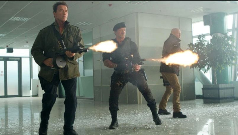 Bruce Willis in the movie The Expendables with Sylvester and Arnold