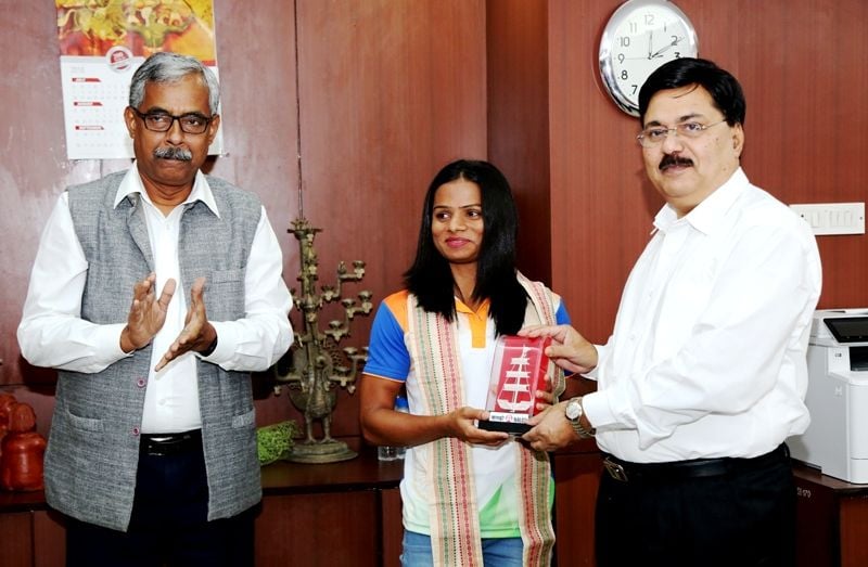 CMD Of NALCO Presenting Dutee With A Token Of Appreciation