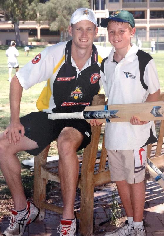 Cameron Green (at the age of nine) with then WA captain Adam Voges in 2008