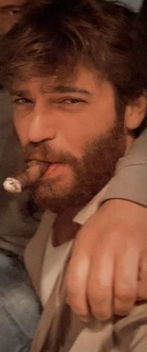 Can Yaman smoking cigar