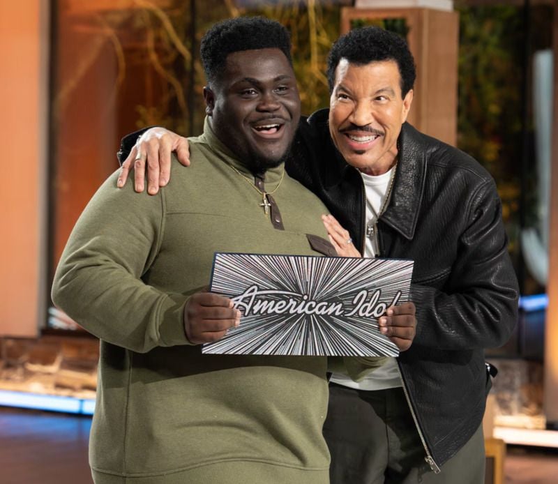 Canaan James Hill while holding his platinum ticket of the season