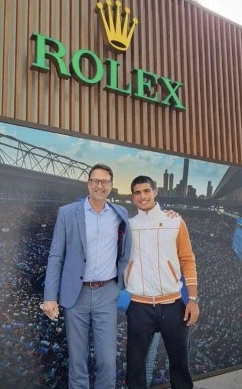 Carlos Alcaraz (right) at Rolex headquarters after signing as their Brand Ambassador