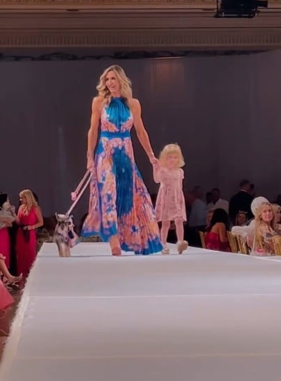Carolina Dorothy Trump with her mother while walking the ramp at a charity event for Big Dog Ranch Rescue