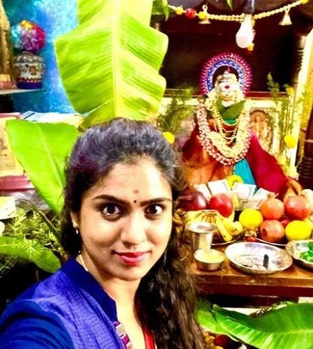 Chaithra Kotoor with an idol of a goddess