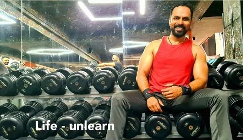 Chakravarthy Chandrachud working out in the gym