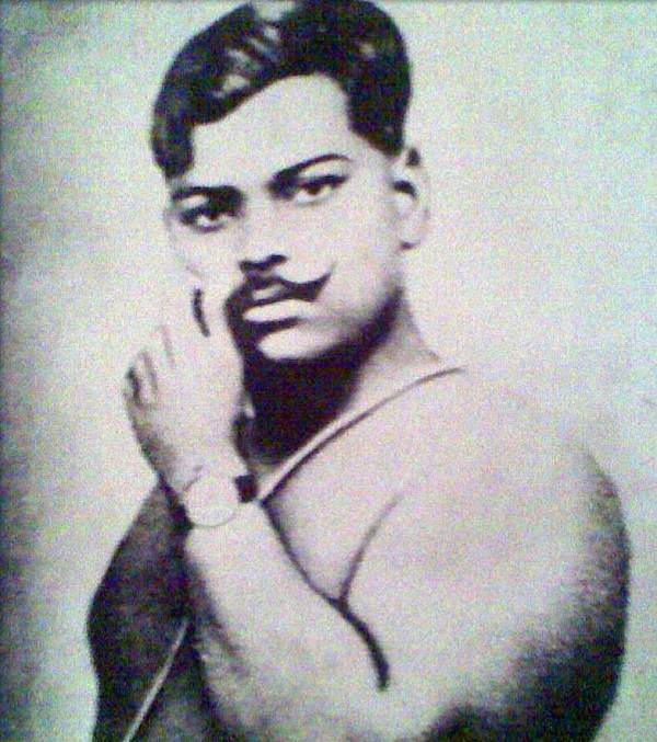 Chandra Shekhar Azad while wearing a Janeau and twisting his moustaches