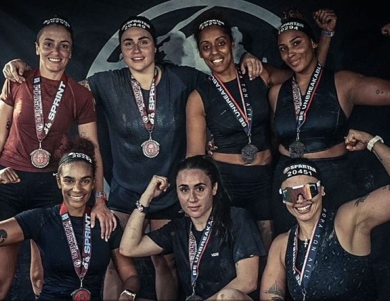 Chanelle Agius (back row, second from left) after completing the Spartan race