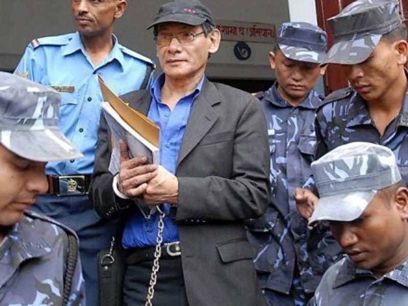 Charles Sobhraj being escorted to his hearing in Nepal