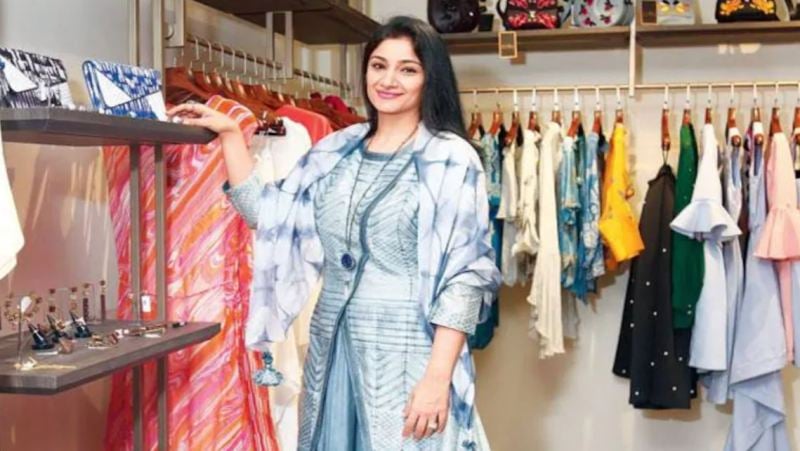 Charu Singh posing at her venture