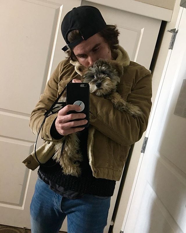 Chase Stokes with his pet dog 