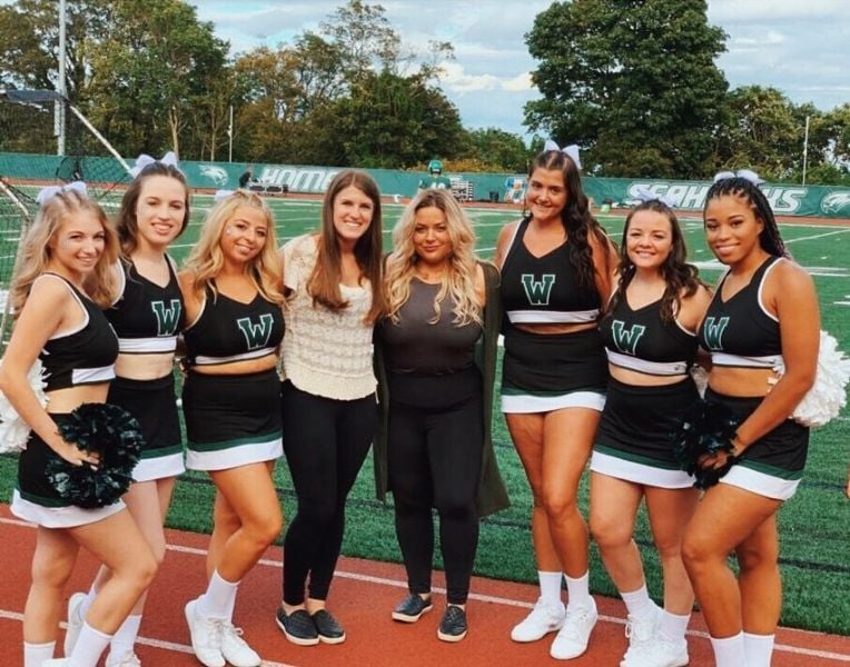 Cheyenne Smith with her cheerleading team