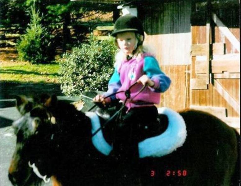 Childhood Picture of Taylor Swift Riding on Her Horse