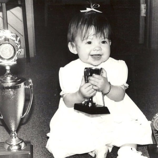 Childhood picture of Alex Nation after winning a baby pageant