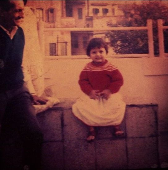 Childhood picture of Arti Nayar with her grandfather