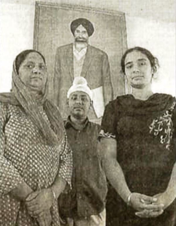 Childhood picture of Janmeet Singh Khalra (centre) with his mother and sister and his father