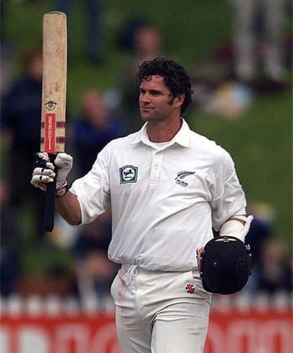 Chris Cairns addressing the spectators after scoring a century