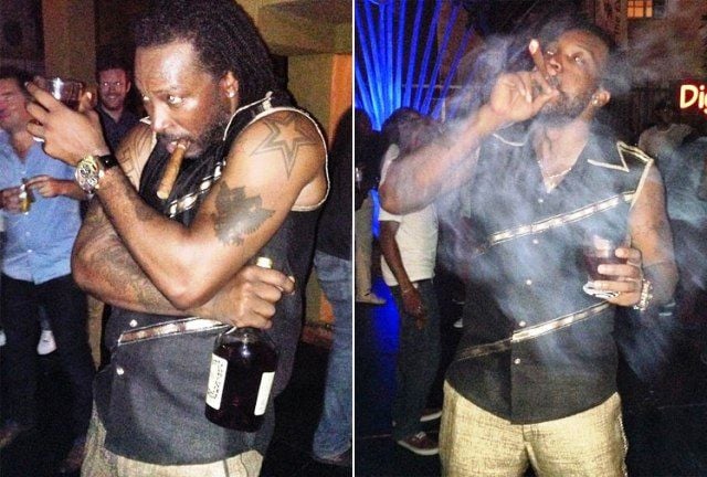 Chris Gayle smokes