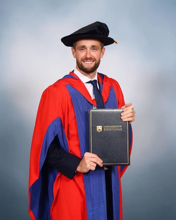 Chris Woakes with his honorary doctorate degree from the University of Birmingham