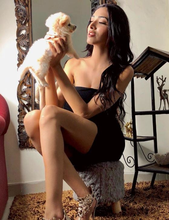 Christeena Biju with a dog