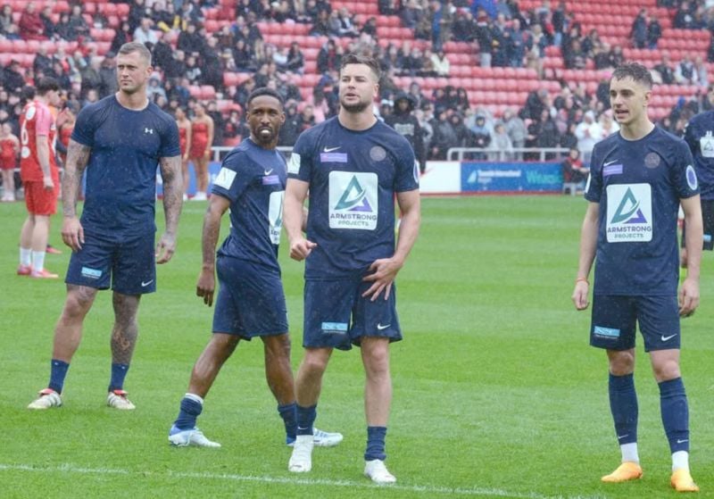 Christopher Hughes (second from right) in a still from one of the football matches for Bourton Rovers Football Club