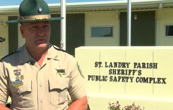 Clay Higgins posing at the St. Landry Parish sheriff