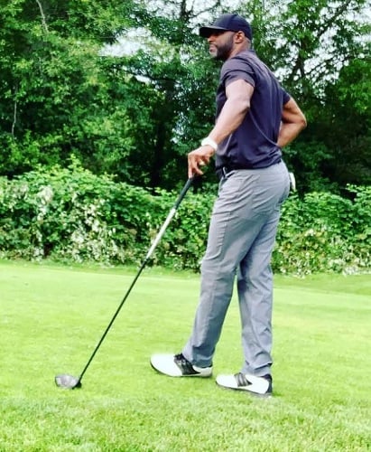 Colin Lawrence playing golf