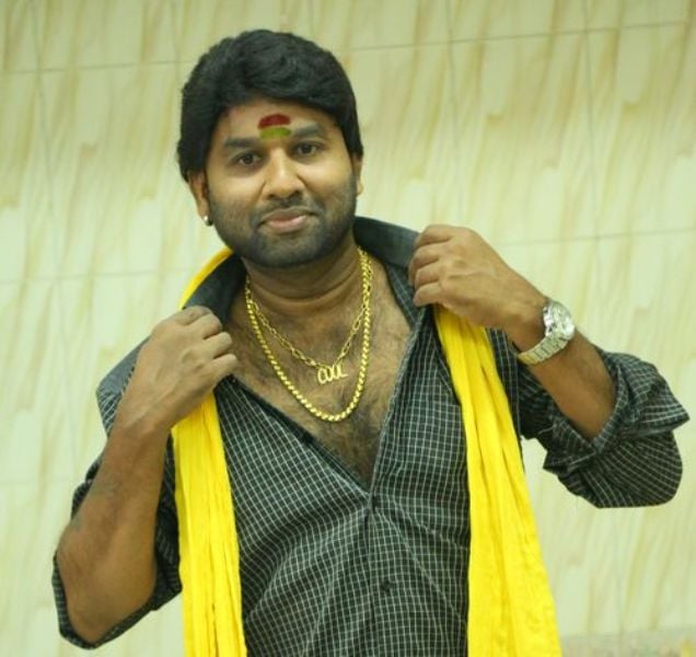 Cool Suresh while showing off his locket