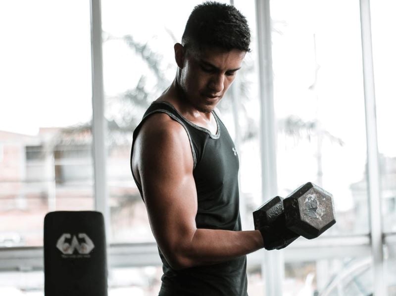 Cristian Pasquel working out at the gym