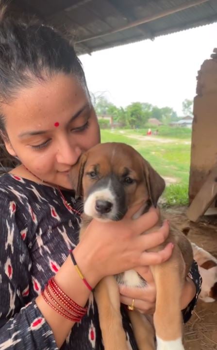 Crzana Subedi with a dog