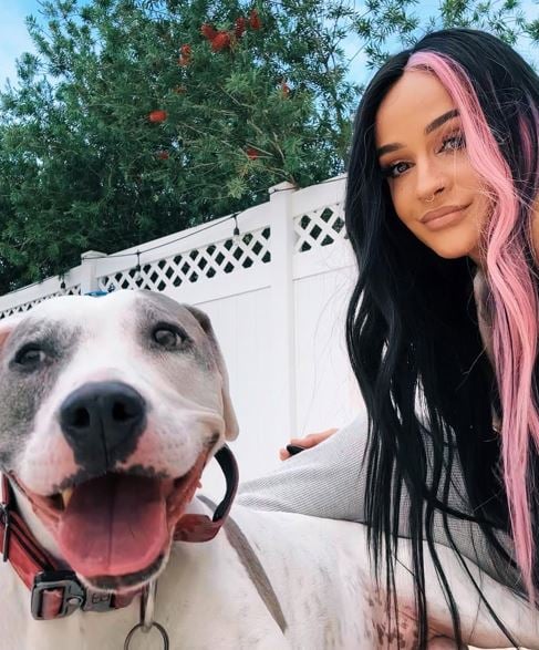 Dakota Kai with her dog