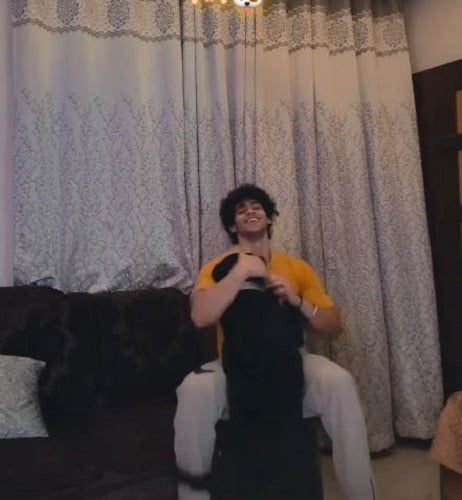 Daksh Pratap Singh with his pet dog