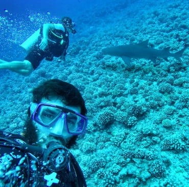 Dan Bilzerian while posing under water