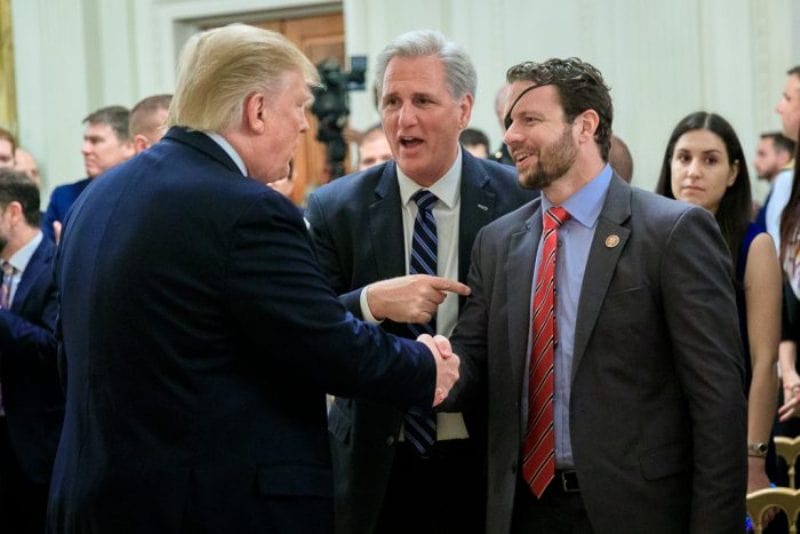 Dan Crenshaw shaking hands with President Donald Trump