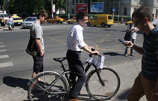 Nicușor Dan on a bicycle during his electoral campaign for Mayor of Bucharest in 2012