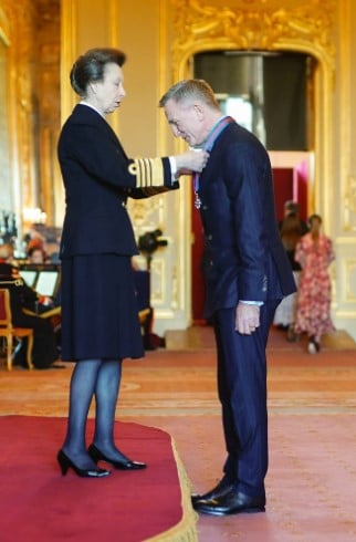 Daniel Craig while receiving the Companion of the Order of St Michael and St George (CMG)
