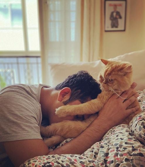 Danish Sait with his pet cat