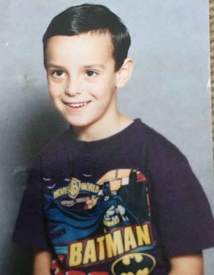 Daryl Mitchell wearing Batman t-shirt during his childhood