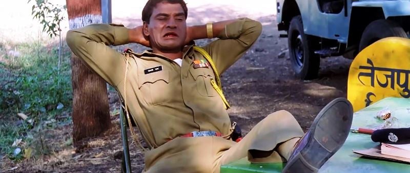 Daya Shankar Pandey as Sub-Inspector Mangni Ram in the action crime drama film Gangaajal (2003)