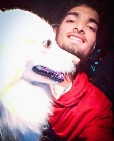 Debansu Rayaguru with his pet dog