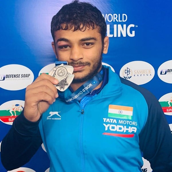 Deepak Punia posing with his silver medal after winning the World Championships