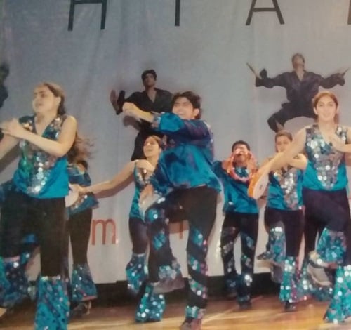 Deepesh Bhan giving a stage performance as a part of Shiamak Davar’s dance group