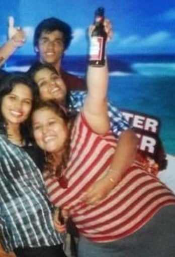 Deepika Khanna with a bottle of alcohol in her hand