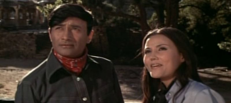 Dev Anand with Vietnamese-American actress Kieu Chinh in a still from the film 