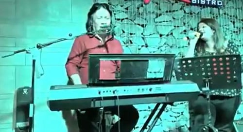 Devashree Sanghvi singing at an event